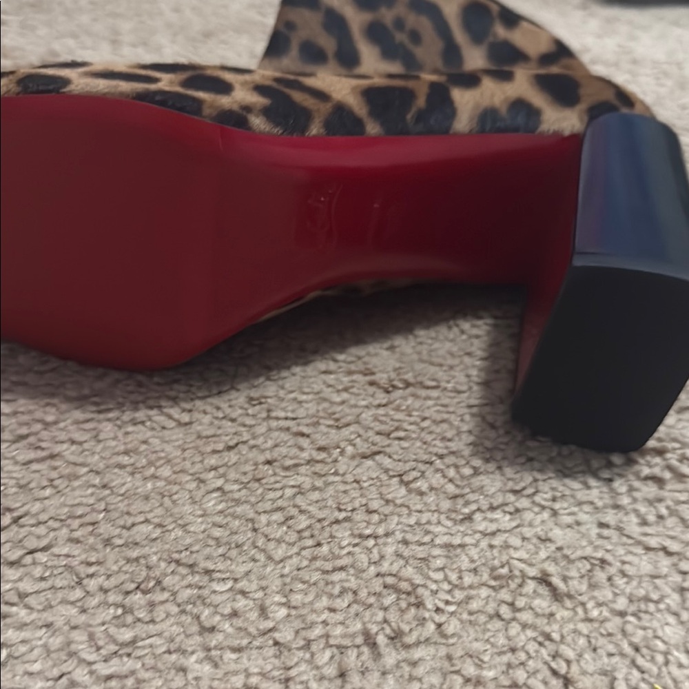 Christian Louboutin Animal Print Heeled Boots with Red Soles